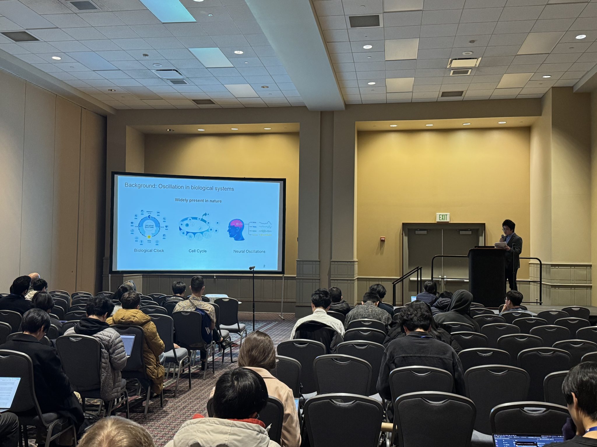 Jason giving presentation at AAAI'25